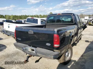 2000 Ford F-350 XL with VIN 1FTSW31FXYED30772, listed as a Copart auction lot 50606445 with 402,923 mi miles and Salvage title. Bid and sale history available at DreamBid. Image 3.