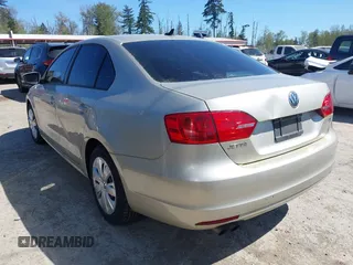 2014 Volkswagen Jetta Sedan SE with VIN 3VWD17AJ1EM270841, listed as a IAAI auction lot 42063625 with 101,481 mi miles. Bid and sale history available at carsss.com. Image 3.