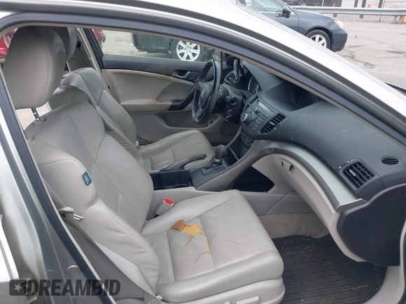 2010 Acura TSX with VIN JH4CU2F60AC019462, listed as a IAAI auction lot 42109261 with 112,131 mi miles. Bid and sale history available at carsss.com. Image 5.
