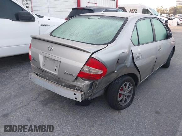 2002 Toyota Prius z VIN JT2BK18U620059498, wystawiony jako IAAI lot #41841301 z przebiegiem 248 718 mil mil oraz . Historia ofert i sprzedaży dostępna na DreamBid. Obrazek 4.