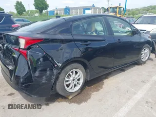 2020 Toyota Prius L Eco z VIN JTDKARFU6L3119565, wystawiony jako IAAI lot #41990990 z przebiegiem Nie podano mil oraz . Historia ofert i sprzedaży dostępna na DreamBid. Obrazek 4.