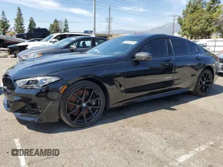 2022 BMW 8 Series M850i with VIN WBAGV8C02NCK08667, listed as a Copart auction lot 50335155 with 22,737 mi miles and Salvage Title. Bid and sale history available at carsss.com. Image 1.