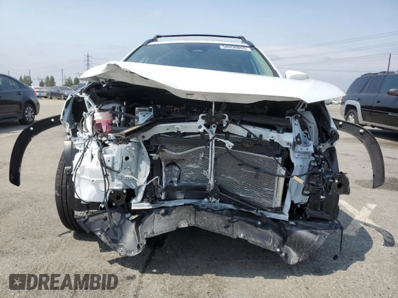 2024 Toyota Corolla Cross XLE with VIN 7MUDAABG4RV105641, listed as a Copart auction lot 58950855 with 5,805 mi miles and Salvage title. Bid and sale history available at DreamBid. Image 5.