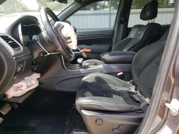 2015 Jeep Grand Cherokee SRT with VIN 1C4RJFDJ9FC842448, listed as a Copart auction lot 56956284 with 178,141 mi miles and Salvage Title. Bid and sale history available at carsss.com. Image 7.