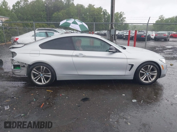 2015 BMW 4 Series 428i with VIN WBA3N3C55FK233180, listed as a IAAI auction lot 42222285 with 190,073 mi miles and . Bid and sale history available at DreamBid. Image 14.