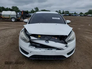 2016 Ford Focus SE с VIN 1FADP3F27GL222556, выставлен на аукционе Copart как лот 59638585 с пробегом 125 648 миль миль и Списание • Salvage title. История ставок и продаж доступна на DreamBid. Изображение 5.