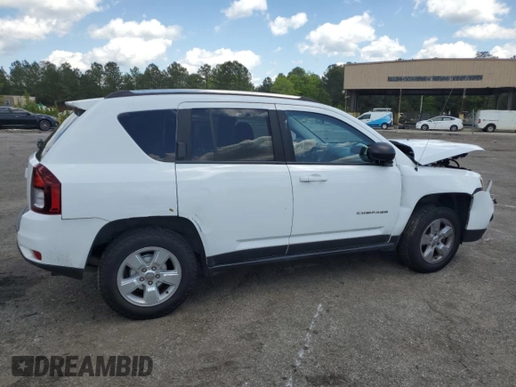 2014 Jeep Compass Sport with VIN 1C4NJCBA5ED844934, listed as a Copart auction lot 52774945 with 148,897 mi miles and Salvage Title. Bid and sale history available at carsss.com. Image 3.