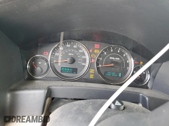 2006 Jeep Commander Limited with VIN 1J8HG58N26C302532, listed as a Copart auction lot 59671125 with 155,835 mi miles and Salvage title. Bid and sale history available at DreamBid. Image 9.