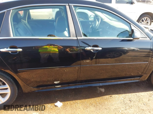 2012 Chevrolet Impala LTZ with VIN 2G1WC5E39C1280827, listed as a IAAI auction lot 41979470 with 153,669 mi miles and . Bid and sale history available at DreamBid. Image 13.