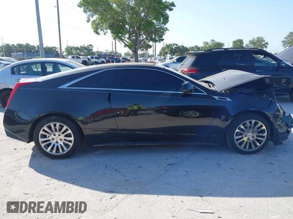 2012 Cadillac CTS Premium z VIN 1G6DP1E3XC0116593, wystawiony jako IAAI lot #42138575 z przebiegiem 198 884 mil mil oraz . Historia ofert i sprzedaży dostępna na DreamBid. Obrazek 13.