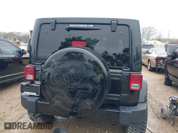 2014 Jeep Wrangler Unlimited Sahara with VIN 1C4HJWEG1EL202974, listed as a IAAI auction lot 41591870 with 17,174 mi miles. Bid and sale history available at carsss.com. Image 17.