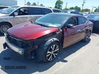 2016 Nissan Maxima SL with VIN 1N4AA6AP2GC408837, listed as a IAAI auction lot 42006849 with 228,119 mi miles and . Bid and sale history available at DreamBid. Image 18.