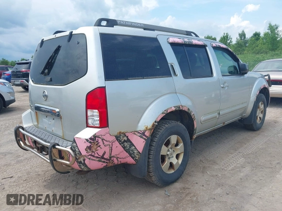 2005 Nissan Pathfinder SE with VIN 5N1AR18W45C779915, listed as a IAAI auction lot 42522452 with 260,904 mi miles and . Bid and sale history available at DreamBid. Image 4.