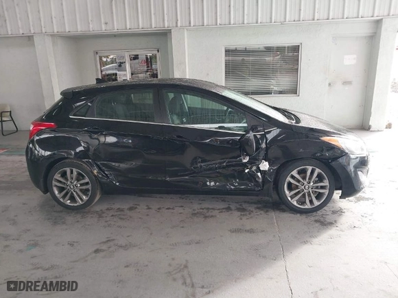 2016 Hyundai Elantra GT with VIN KMHD35LH0GU340433, listed as a IAAI auction lot 41183897 with 106,497 mi miles. Bid and sale history available at carsss.com. Image 13.