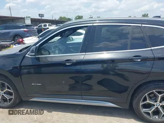 2017 BMW X1 xDrive28i with VIN WBXHT3Z30H4A65417, listed as a IAAI auction lot 42328797 with 103,788 mi miles and . Bid and sale history available at DreamBid. Image 14.