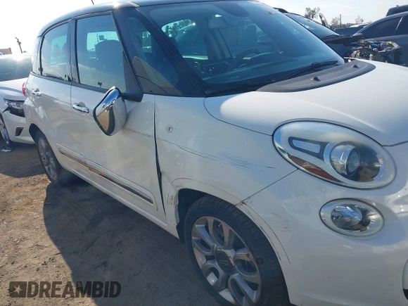 2014 FIAT 500L Lounge with VIN ZFBCFACH9EZ004041, listed as a IAAI auction lot 41366234 with 106,769 mi miles and . Bid and sale history available at DreamBid. Image 6.