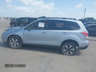 2017 Subaru Forester with VIN JF2SJABC5HH474561, listed as a IAAI auction lot 42532755 with 99,797 mi miles and . Bid and sale history available at DreamBid. Image 14.