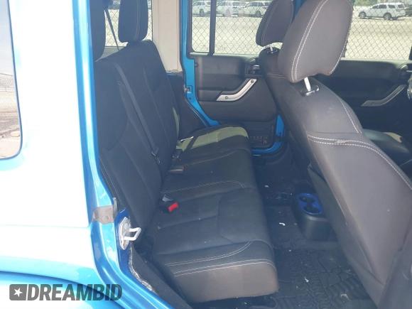2016 Jeep Wrangler Unlimited Sahara with VIN 1C4HJWEG0GL154418, listed as a IAAI auction lot 41892333 with 102,410 mi miles and . Bid and sale history available at DreamBid. Image 8.