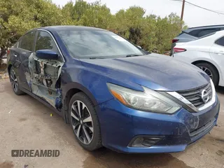 2018 Nissan Altima SV with VIN 1N4AL3AP0JC112456, listed as a IAAI auction lot 41871501 with 136,497 mi miles and . Bid and sale history available at carsss.com. Image 6.