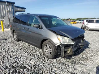 2007 Honda Odyssey EX z VIN 5FNRL38447B407130, wystawiony jako Copart lot #58394935 z przebiegiem 129 893 mil mil oraz Szkoda całkowita • Salvage title. Historia ofert i sprzedaży dostępna na DreamBid. Obrazek 4.