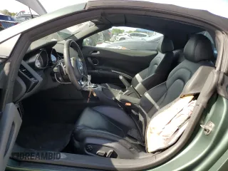 2015 Audi R8 z VIN WUASUAFG1F7001863, wystawiony jako Copart lot #68133794 z przebiegiem 10 571 mil mil oraz Szkody całkowita. Historia ofert i sprzedaży dostępna na DreamBid. Obrazek 7.