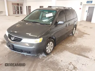 2004 Honda Odyssey EX z VIN 5FNRL18674B050429, wystawiony jako IAAI lot #41655622 z przebiegiem 257 656 mil mil oraz . Historia ofert i sprzedaży dostępna na DreamBid. Obrazek 2.