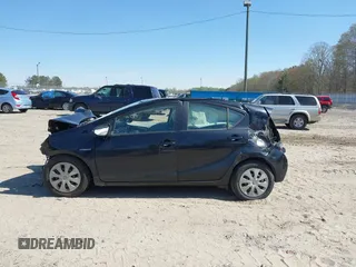 2013 Toyota Prius One z VIN JTDKDTB33D1529206, wystawiony jako IAAI lot #41874722 z przebiegiem 99 417 mil mil oraz . Historia ofert i sprzedaży dostępna na DreamBid. Obrazek 13.