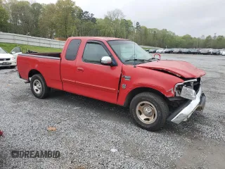 2000 Ford F-150 XL with VIN 1FTRX17W7YNA34762, listed as a Copart auction lot 51190685 with 0 mi miles and Salvage Title. Bid and sale history available at carsss.com. Image 4.