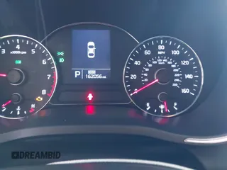 2016 Kia Forte EX with VIN KNAFX4A81G5528190, listed as a IAAI auction lot 42142075 with 162,056 mi miles. Bid and sale history available at carsss.com. Image 7.
