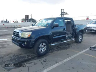 2008 Toyota Tacoma PreRunner with VIN 3TMJU62N88M058614, listed as a IAAI auction lot 41442510 with 140,973 mi miles. Bid and sale history available at carsss.com. Image 2.