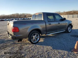 2002 Ford F-150 Harley Davidson with VIN 1FTRW07372KD29243, listed as a Copart auction lot 42972905 with 164,392 mi miles and Salvage Title. Bid and sale history available at carsss.com. Image 3.