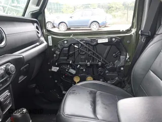 2023 Jeep Wrangler Sahara with VIN 1C4JJXP64PW684210, listed as a IAAI auction lot 42244388 with 23,622 mi miles and . Bid and sale history available at DreamBid. Image 19.