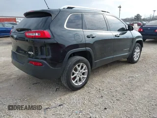 2015 Jeep Cherokee Latitude with VIN 1C4PJMCB6FW527448, listed as a IAAI auction lot 42074461 with 139,795 mi miles and . Bid and sale history available at carsss.com. Image 4.