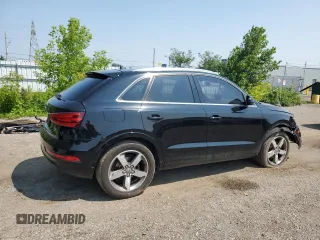 2015 Audi Q3 with VIN WA1EFEFS7FR002823, listed as a Copart auction lot 62159355 with 163,640 mi miles and Salvage title. Bid and sale history available at DreamBid. Image 3.
