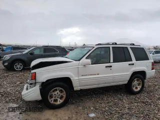 1996 Jeep Grand Cherokee Limited with VIN 1J4GZ78Y0TC185669, listed as a Copart auction lot 79032274 with 184,929 mi miles and Salvage Title. Bid and sale history available at carsss.com. Image 1.