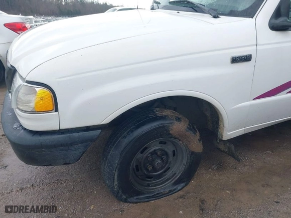 1998 Mazda B-Series 2WD Truck SX with VIN 4F4YR12C1WTM04588, listed as a IAAI auction lot 41563617 with 348,698 mi miles. Bid and sale history available at carsss.com. Image 6.