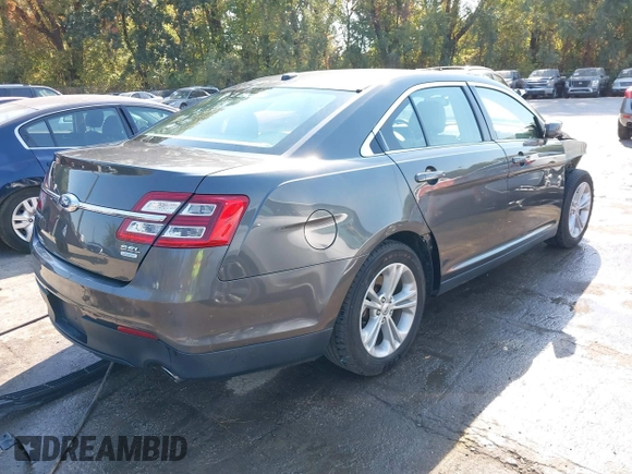 2016 Ford Taurus SEL with VIN 1FAHP2E98GG111257, listed as a IAAI auction lot 40538192 with 75,203 mi miles and . Bid and sale history available at DreamBid. Image 4.