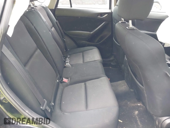 2016 Mazda CX-5 Sport with VIN JM3KE2BE8G0804398, listed as a IAAI auction lot 40490953 with 116,279 mi miles and . Bid and sale history available at DreamBid. Image 8.