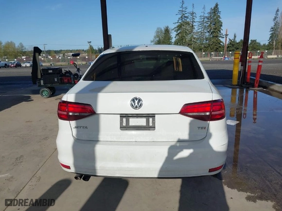 2016 Volkswagen Jetta Sedan 1.4T S with VIN 3VW267AJXGM215994, listed as a IAAI auction lot 41993650 with 130,988 mi miles. Bid and sale history available at carsss.com. Image 16.