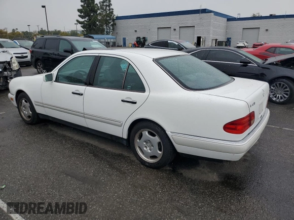 1997 Mercedes-Benz E-Class with VIN WDBJF72F2VA099305, listed as a Copart auction lot 48007935 with 96,410 mi miles and Salvage Title. Bid and sale history available at carsss.com. Image 2.