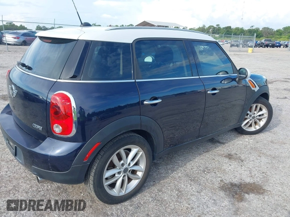 2013 MINI Countryman with VIN WMWZB3C5XDWM31035, listed as a IAAI auction lot 42543943 with 151,209 mi miles and . Bid and sale history available at DreamBid. Image 4.