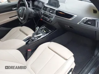 2018 BMW 2 Series 230i with VIN WBA2J1C50JVD09751, listed as a IAAI auction lot 41440752 with 71,700 mi miles. Bid and sale history available at carsss.com. Image 5.