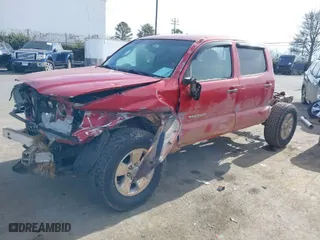 2011 Toyota Tacoma with VIN 5TFLU4ENXBX016911, listed as a IAAI auction lot 41405398 with 168,088 mi miles. Bid and sale history available at carsss.com. Image 2.