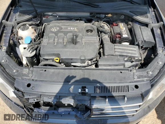 2015 Volkswagen Passat SE z VIN 1VWBV7A39FC066580, wystawiony jako Copart lot #54705935 z przebiegiem 162 056 mil mil oraz Szkoda całkowita • Salvage title. Historia ofert i sprzedaży dostępna na DreamBid. Obrazek 11.