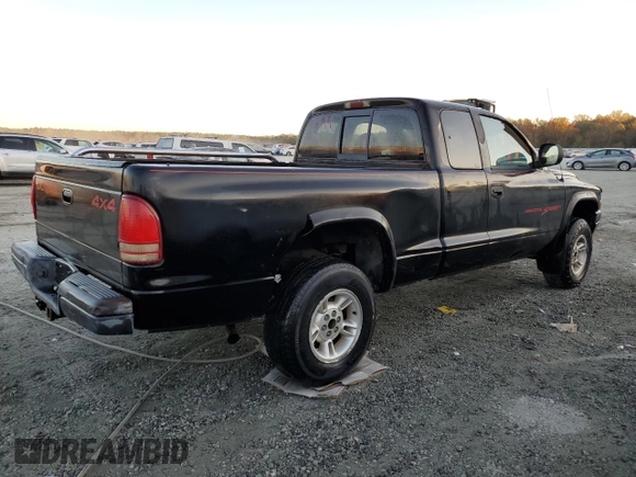1999 Dodge Dakota SLT with VIN 1B7GG22X1XS235134, listed as a Copart auction lot 77482224 with 172,701 mi miles and Salvage Title. Bid and sale history available at carsss.com. Image 3.