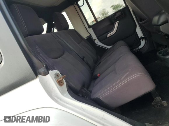 2013 Jeep Wrangler Unlimited Sahara with VIN 1C4BJWEG4DL536694, listed as a Copart auction lot 57714035 with 146,257 mi miles and Salvage title. Bid and sale history available at DreamBid. Image 11.