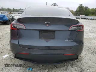 2021 Tesla Model Y Long Range z VIN 5YJYGDEE0MF254020, wystawiony jako Copart lot #51666865 z przebiegiem 25 805 mil mil oraz Szkody całkowita. Historia ofert i sprzedaży dostępna na DreamBid. Obrazek 6.