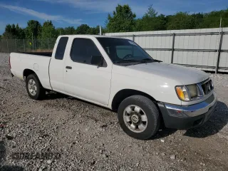 1999 Nissan Frontier XE with VIN 1N6DD26S4XC319806, listed as a Copart auction lot 54233635 with 311,759 mi miles and Clean title. Bid and sale history available at DreamBid. Image 4.