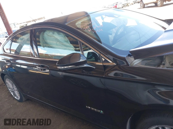 2014 Ford Fusion SE Hybrid with VIN 3FA6P0LUXER291754, listed as a IAAI auction lot 42415936 with 154,474 mi miles and . Bid and sale history available at DreamBid. Image 13.