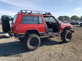 1996 Jeep Cherokee Sport with VIN 1J4FJ67S2TL167992, listed as a Copart auction lot 81329654 with 148,031 mi miles and Non Repairable. Bid and sale history available at carsss.com. Image 3.